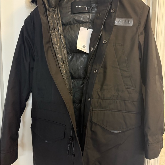 Coach 3-1 Shearling Parka 
Heavy jacket great for the winter . 
Quality Jacket - Picture 6 of 9